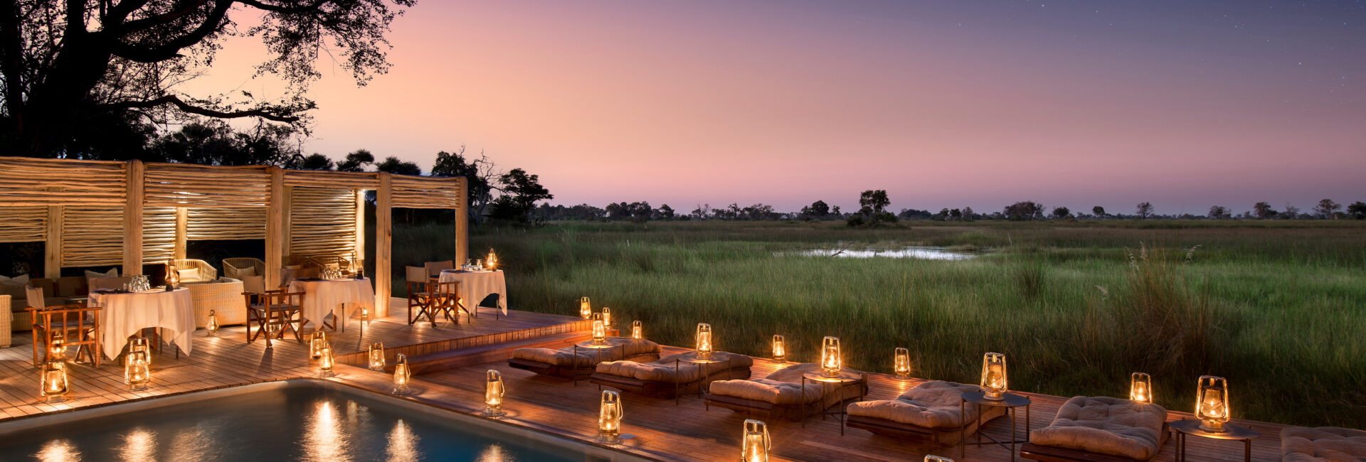 Botswana-Nxabega-Okavango-Tented-Camp-Guest-Area-Deck-dinner-at-the-pool